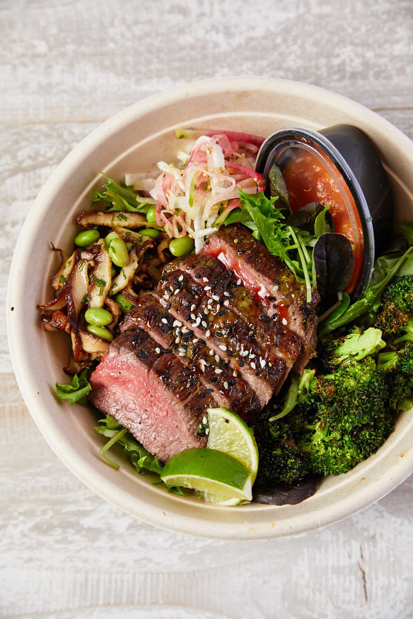 Grilled flank steak and broccoli bowl